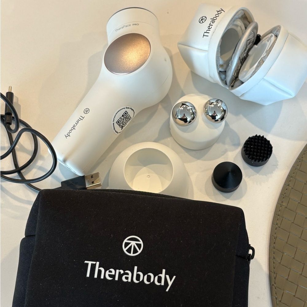 Therabody White TheraFace Device with Attachments and Black Pouch